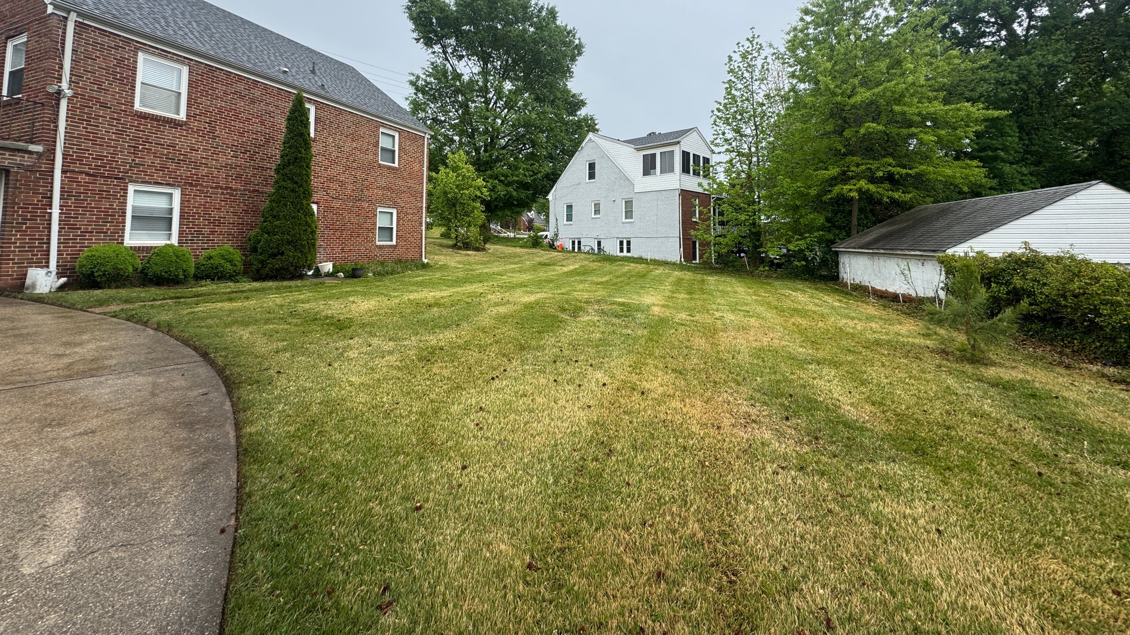 Quiet suburban neighborhood landscape with well-maintained homes and open yard space near Landover Hills, Maryland